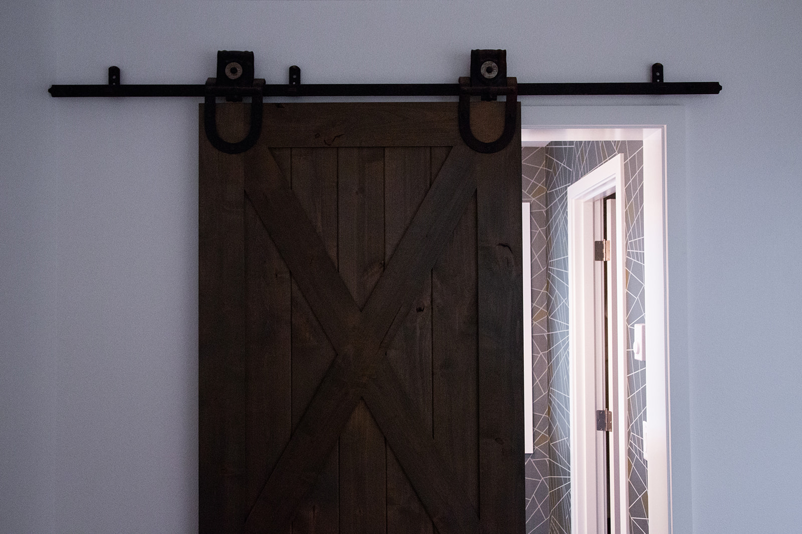 barn door detail with salvaged door hardware