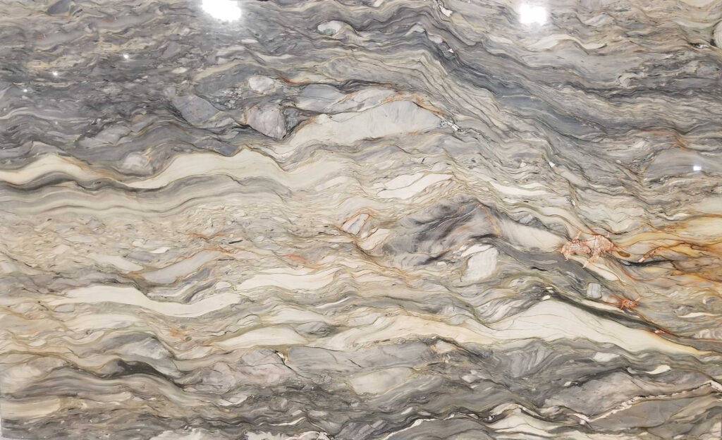 Natural stone slab with blue, grey, green, copper and ivory veining.