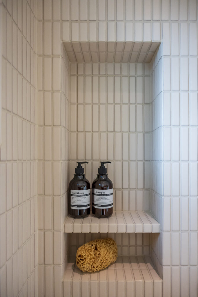 stacked ivory tile, shower niche